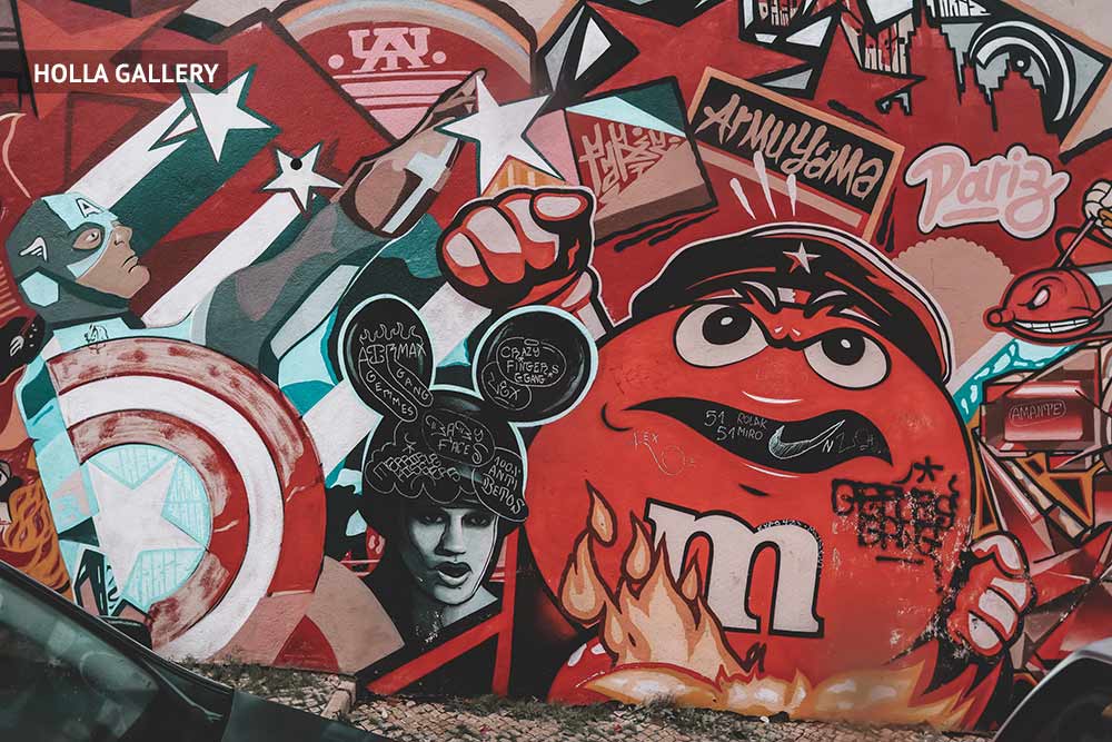 Большое граффити на улице Лиссабона в стиле Шепарда Фейри. 
